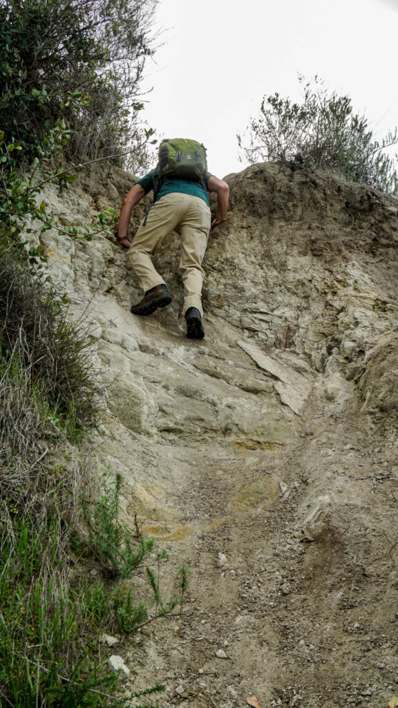 Alex climbing some cliffs along the trail to Mount Calavera, Califonia