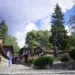Visit Koprivshtitsa - view of the beautiful cobblestone streets and Todor Kableshkov Monument